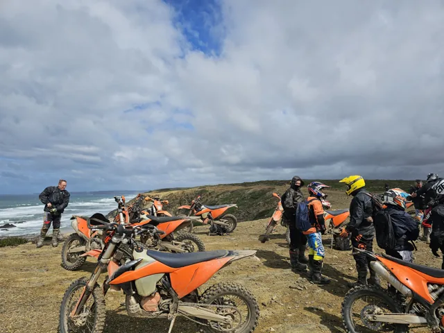 Riders and KTMs above the Atlantic