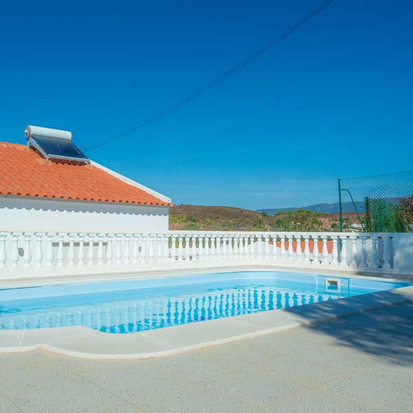 Swimming pool and sunny terrace at the Let’s Ride Portugal house