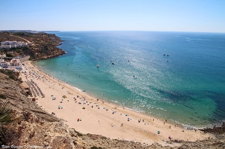 Praia do Burgau, Algarve. A village wrapped around its bay.