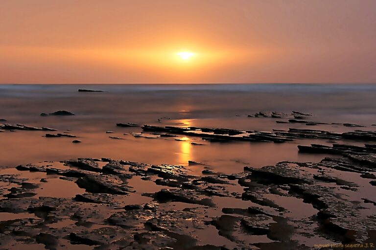 Praia do Canal, Algarve. Rock shelves and Atlantic sunsets.