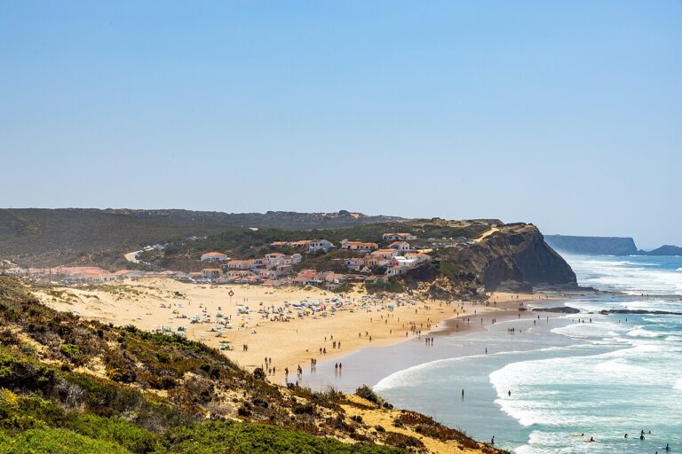 Praia do Monte Clérigo, Algarve. A small coastal village above the sand.