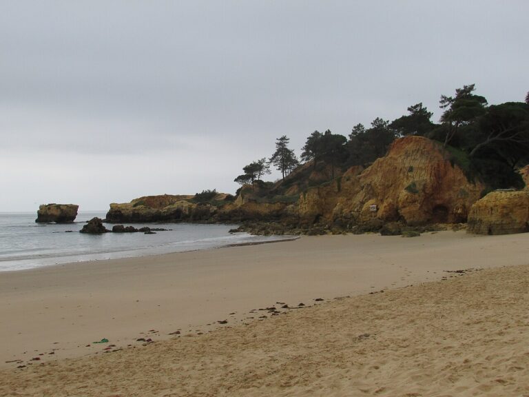 Praia de Santa Eulália, Algarve. Sand, pale cliffs and a green backdrop.