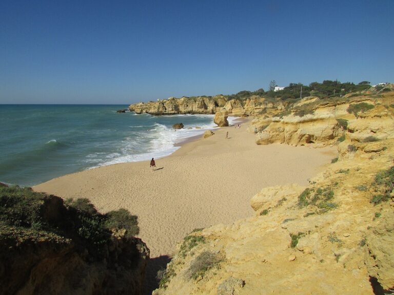 Praia de São Rafael, Algarve. Golden cliffs and a sculpted bay.