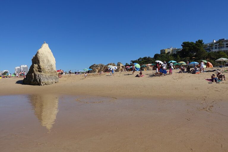 Praia dos Três Irmãos, Algarve. Golden rocks at the edge of Alvor.