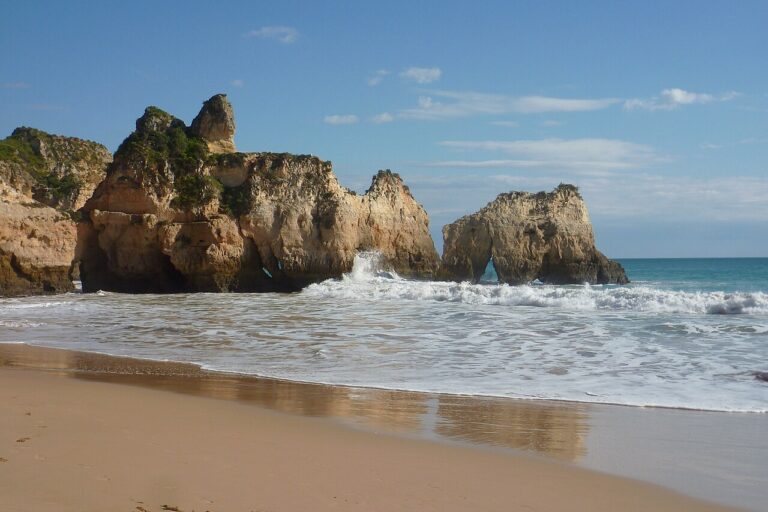 Praia do Vau, Algarve. A sandy bay with sculpted sea stacks.
