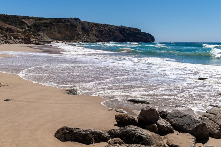 Praia do Zavial, Algarve. A sandy bay with a rugged edge.