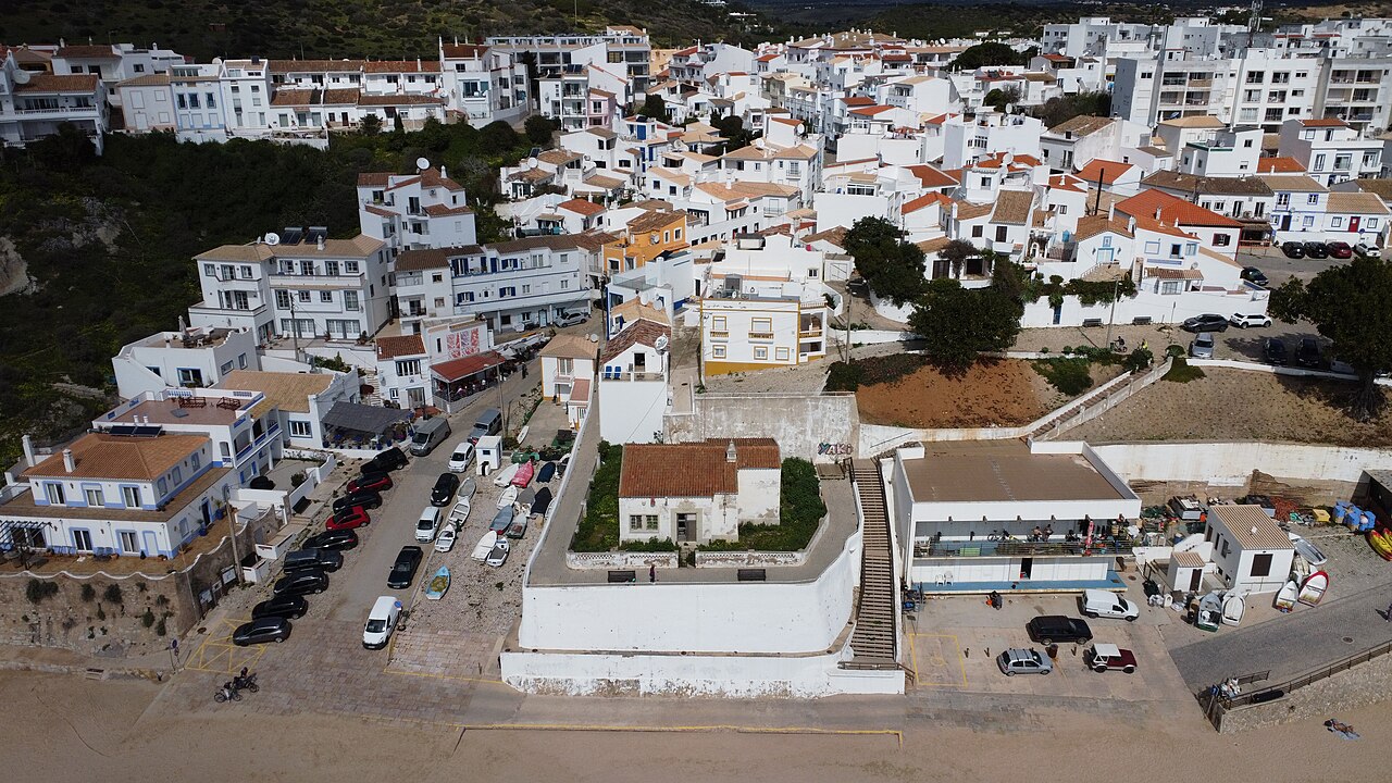 An aerial view over the tiled roofs and streets of Burgau.