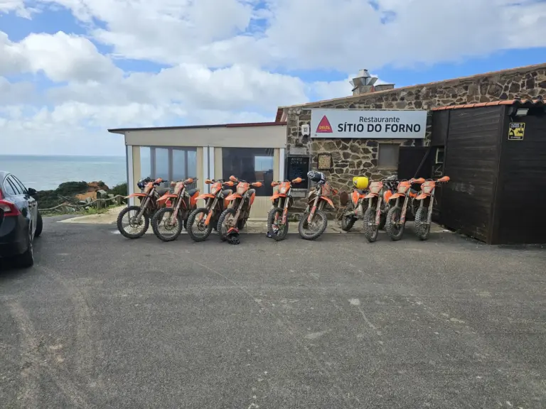 Enduro motorcycles outside Sítio do Forno near Carrapateira