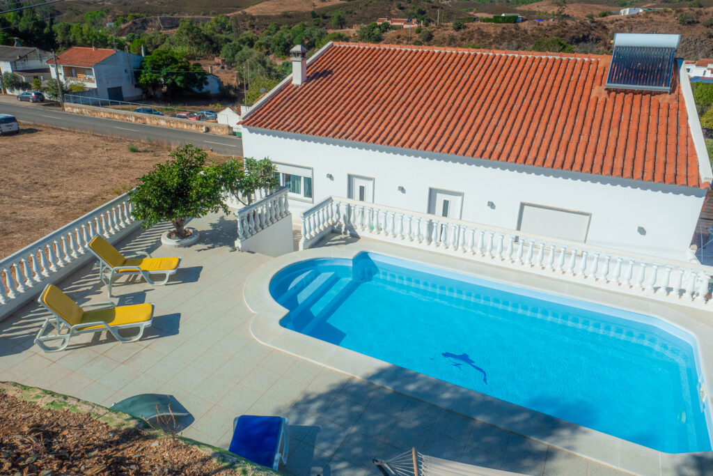 The pool and sunny terrace at the Lets Ride Portugal base in Rasmalho